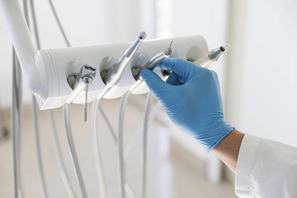Professional Tooth Extraction technician working in Beverly Hills, FL